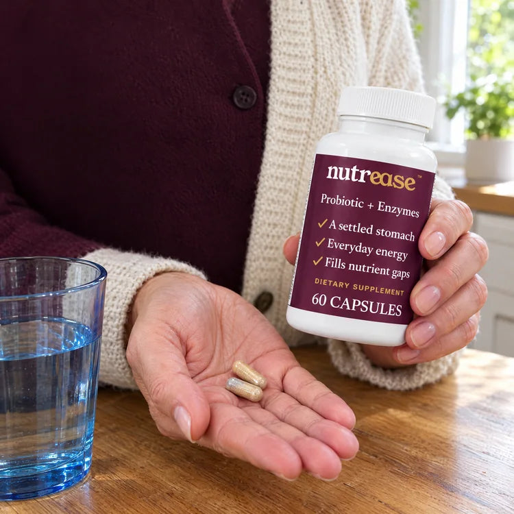Hands holding a Nutrease bottle and two tan capsules beside a glass of water